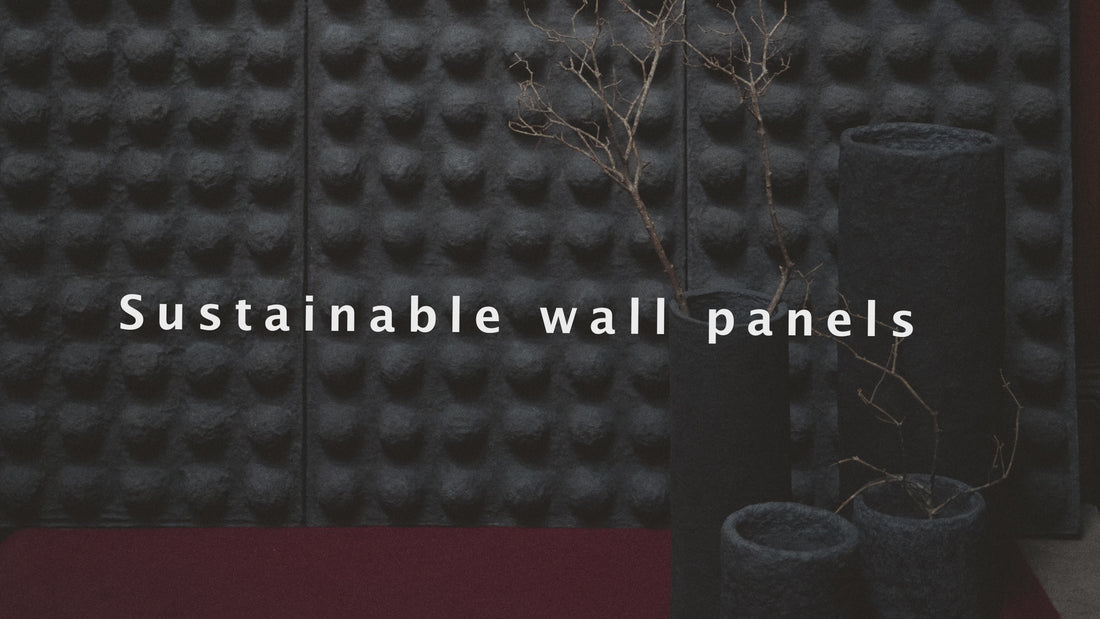 Hand-sculpting a bio-mineral wall panel in our Scottish workshop: recycled cellulose fibre and a lime-chalk mineral matrix applied by hand onto a wood-wool base